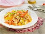 Pasta salad with shrimps,zucchini and orange