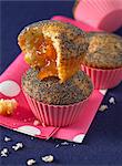 Poppyseed muffins with apricot jam filling