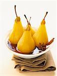 Pears poached in spicy white wine