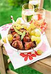 Quail and bacon brochettes