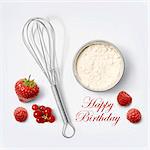 Flour and whisk for a birthday cake