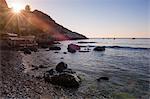 Sunstar at Isola Bella Beach at sunrise, Taormina, Sicily, Italy, Mediterranean, Europe