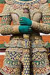 Indrajit Giant statue guards an entrance to Wat Phra Kaeo, Bangkok, Thailand