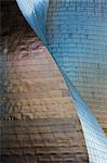 Architect Frank Gehry's Guggenheim Museum futuristic architectural design in titanium and glass at Bilbao, Basque country, Spain