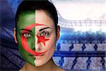 Composite image of beautiful iran fan in face paint against large football stadium with lights