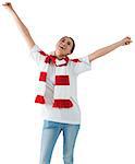 Excited asian football fan cheering on white background