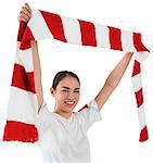 Football fan waving red and white scarf on white background