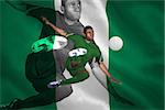 Football player in green kicking against digitally generated nigerian national flag