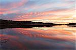 A very pretty sunrse unfolds over the tranquil Narrabeen Lakes, NSW Australia