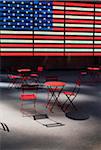 Electronic American Flag with empty tables and chairs, Times Square, New York City, New York, USA