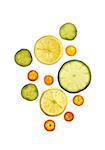 Lemon, lime, cucumber and kumquat slices on white background, studio shot