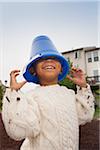 Portrait of Boy with Blue Bucket on his Head, Maryland, USA