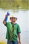 Boy with Fishing Line full of Pondweed, Lake Fairfax, Reston, Virginia, USA