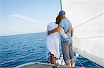 Mature couple on sailboat, looking at view, Adriatic Sea, Croatia