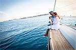 Mature couple on sailboat, relaxing, Adriatic Sea, Croatia