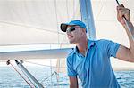 Mature man on sailboat, looking away, Adriatic Sea, Croatia