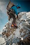 Alpinist ice climbing, on the rope, Zugspitze Mountain, Bavaria, Gerrmany