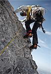 Alpinist rock climbing, on the rope, Zugspitze, Bavaria, Germany