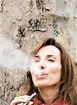 Woman smoking electronic cigarette