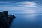 Neist Point Light House and the Inner Hebrides at dusk, Isle of Skye, Scotland