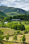 Cottages in Langdale Pass surrounded by Langdale Pikes in the Lake District National Park, Cumbria, UK