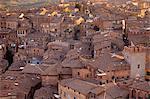 Aerial view of Siena from Il Torre, clock tower, in Piazza del Campo, Siena, Italy