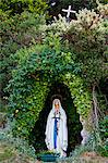 Grotto with statue of the Virgin Mary and The Immaculate Conception at Ballinspittle near Kinsale, County Cork, Ireland