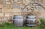 Traditional old wine barrels at a wine chai near St Emilion, Bordeaux, France