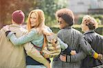 Friends walking together outdoors