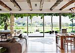Open floor plan in luxury house overlooking vineyard