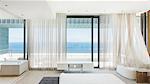 Modern bedroom overlooking ocean