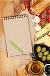 Blank notepad  and various foods