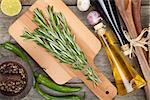 Herbs, spices and seasoning over wooden table background