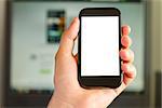 Closeup of Man's Hand holding a Smartphone in Office