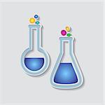 Two colorful test tubes isolated on grey background