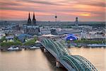 Image of Cologne with Cologne Cathedral during sunset.