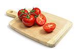 Fresh tomatoes on wooden chopping board, isolated on white background with shadow