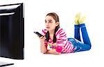 little girl watching LED tv laying on white background