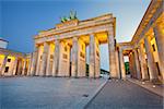 Image of Brandenburg Gate in Berlin during twilight blue hour.