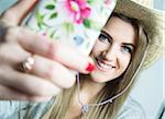 Young Woman taking Selfie, Studio Shot