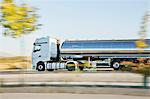 Stainless steel milk tanker on the road
