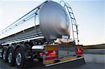 Stainless steel milk tanker on the road