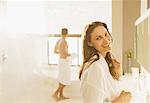 Portrait of smiling woman in bathroom