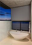 Soaking tub in modern bathroom