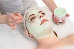 beauty salon, facial mask applying using brush