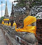 AYUTTHAYA, THAILAND - JANUARY 22, 2011: Buddha statues on temple Wat Yai Chai Mongkon on January 22, 2011 in Ayutthaya, Thailand, Asia
