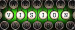 Vision on Old Typewriter's Keys on Green Background.