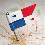 Small Flag of Panama on a Map Background with Selective Focus.
