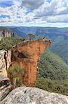 View of Hanging Rock from Baltzer Lookout, Blackheath in the Blue Mountains NSW Australia.  Hanging Rock is detached from the main cliff face by a vertical crack of about half to one meter across and Hanging Rock isvery narrow about 1 metre wide