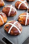 Easter hot cross buns on a baking sheet
